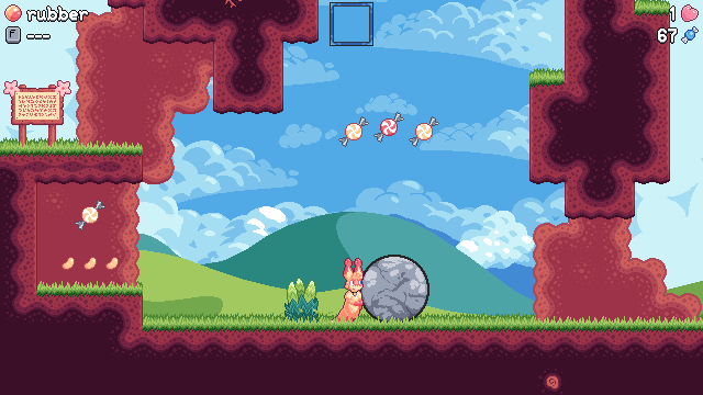 screenshot of the newer game showing an arc of swirl candies that can be grabbed in one careful jump